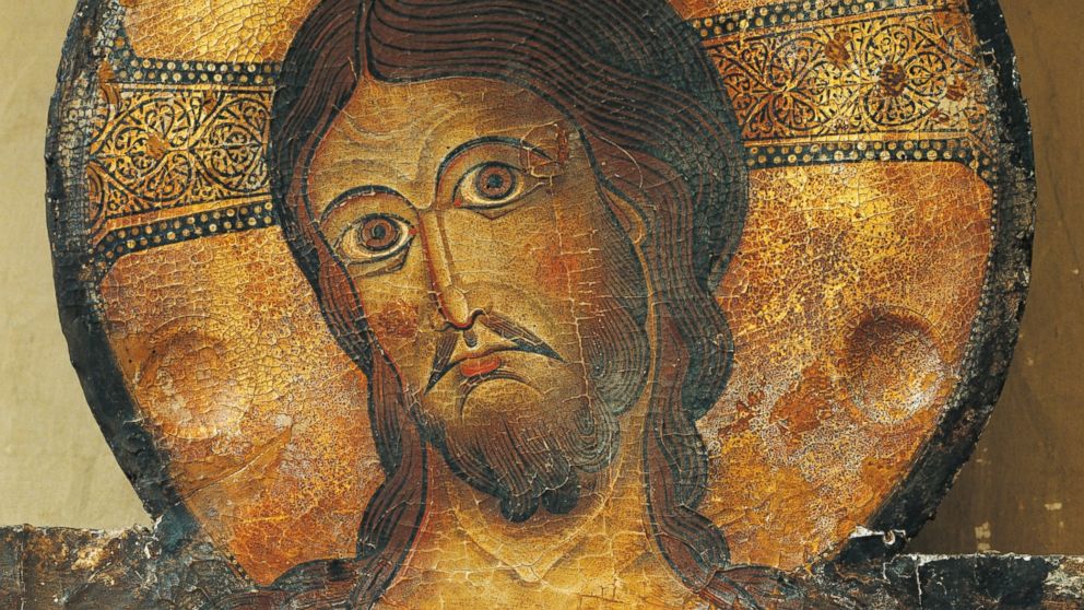  Christ's face is seen in a detail from the Crucifix, 1187, by Alberto Sotio, Cathedral of the Assumption of Mary, Spoleto, Umbria, Italy  